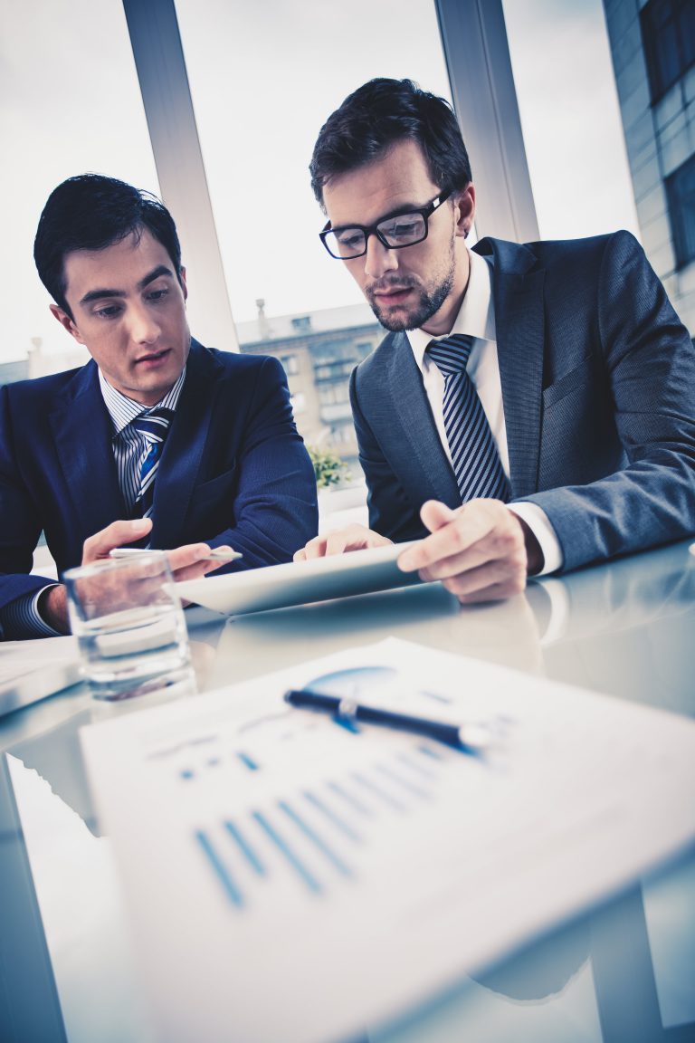 executives-working-hard-with-tablet-min