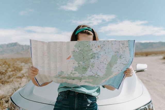 Girl reading the map 