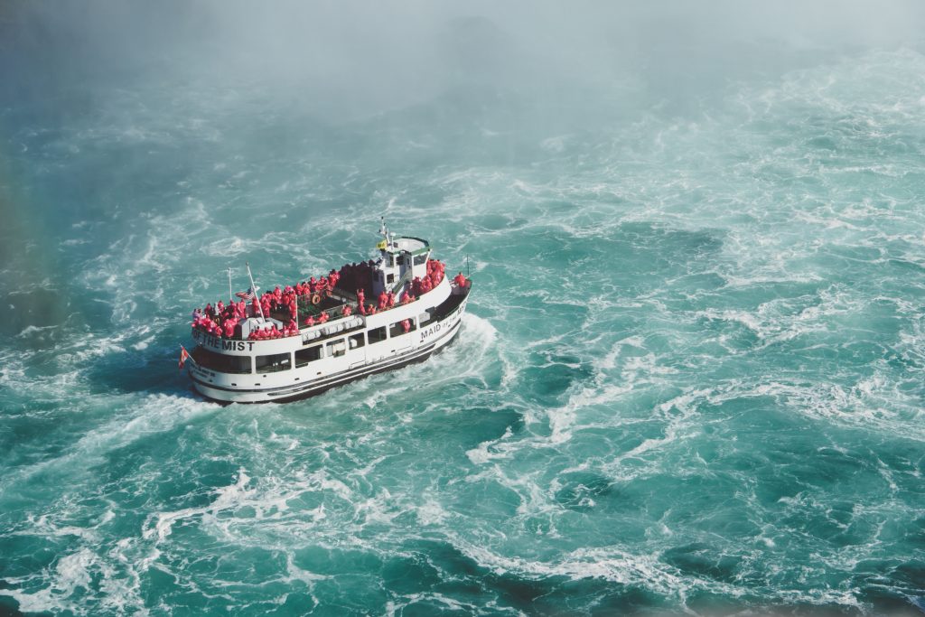 Turbulent stormy sea with a boat