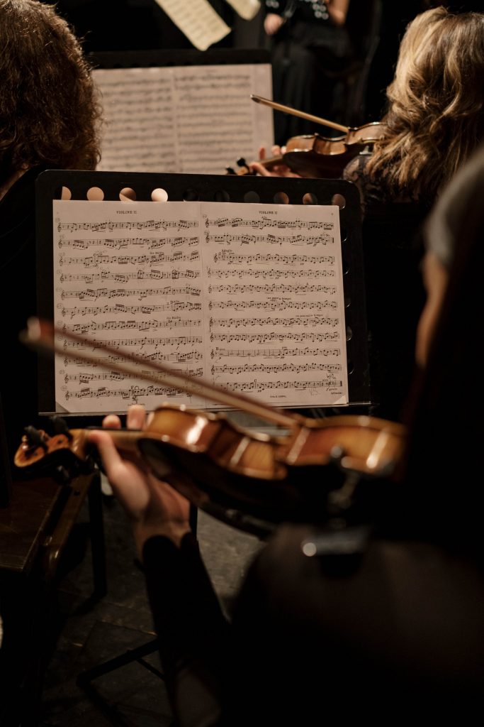 People playing violins